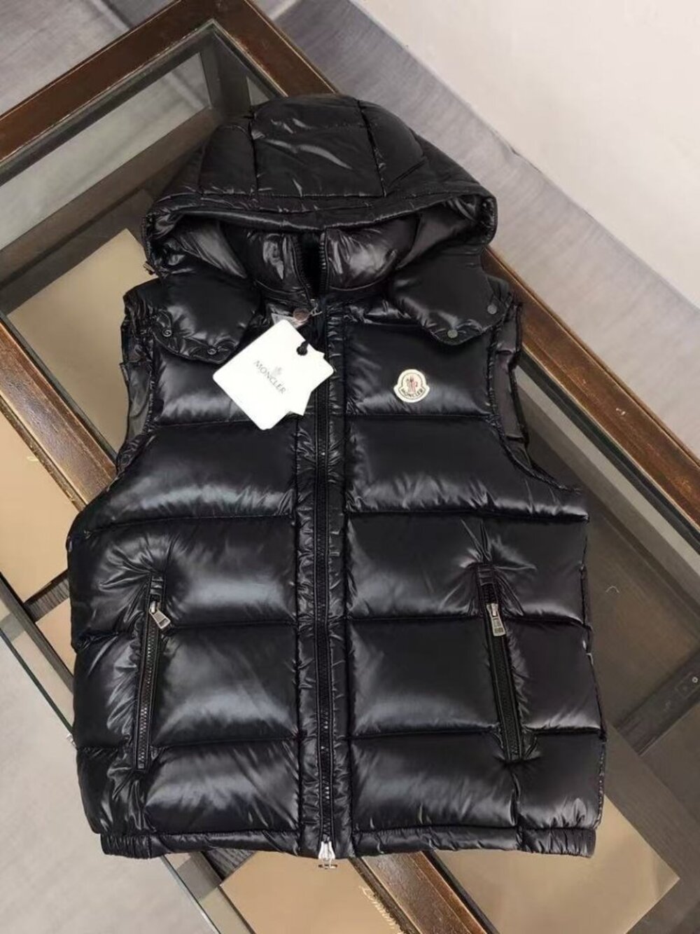 Moncler hooded down vest, size S.
